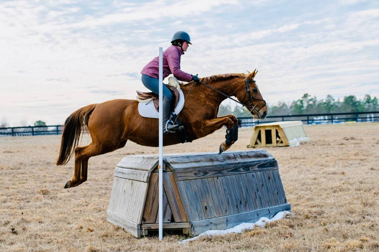 Samantha Baer jumping cross-country